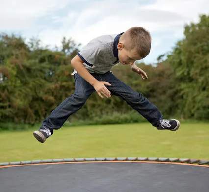 autistic-boy-on-trampoline